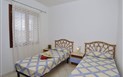 Residence L´Uddastru - Pohled na ložnici s oddělenými lůžky, San Teodoro, Sardinie